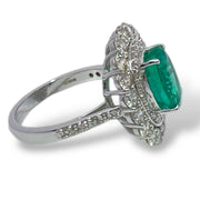 14k White Gold Oval cut Emerald & Diamond halo Ring
