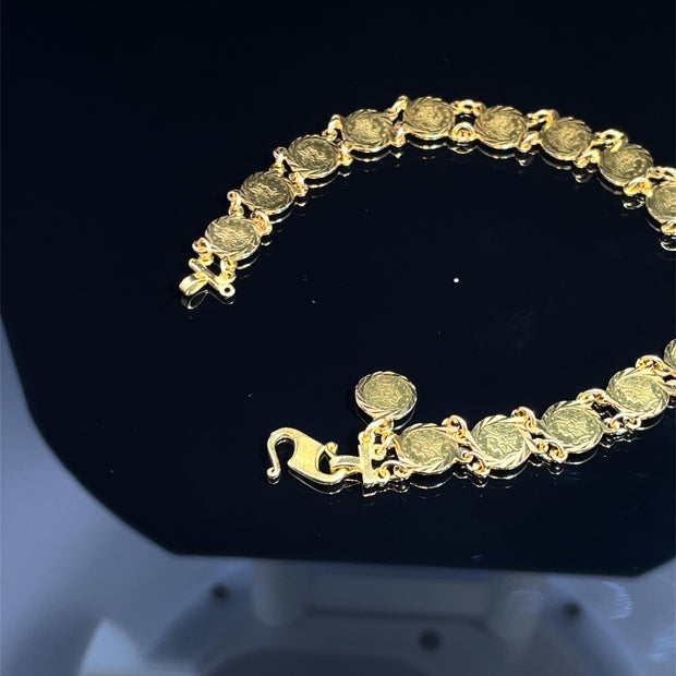 MINI TOKENS BRACELET IN 18K YELLOW GOLD