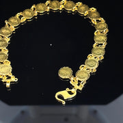 MINI TOKENS BRACELET IN 18K YELLOW GOLD