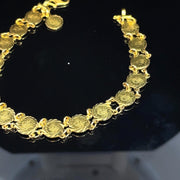 MINI TOKENS BRACELET IN 18K YELLOW GOLD
