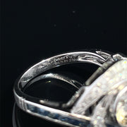 18K White Gold swirling Blue Sapphire and Natural Diamond Ring