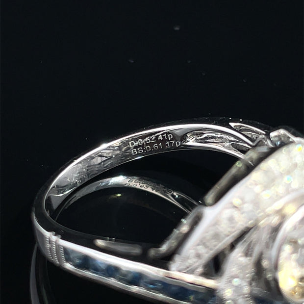 18K White Gold swirling Blue Sapphire and Natural Diamond Ring
