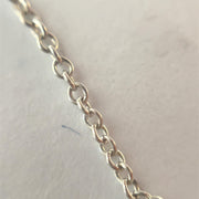 Solid White Gold Diamond Studded Peace Necklace