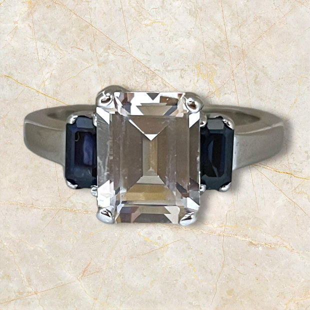 Elegant Emerald-Cut Ring with Sapphire Accents in Sterling Silver