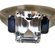 Elegant Emerald-Cut Ring with Sapphire Accents in Sterling Silver