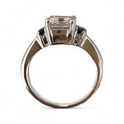 Elegant Emerald-Cut Ring with Sapphire Accents in Sterling Silver