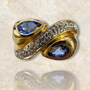 Swirling Beauty: 14K Yellow Gold Pear-Shaped Tanzanite and Diamond Ring