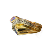 Swirling Beauty: 14K Yellow Gold Pear-Shaped Tanzanite and Diamond Ring