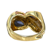 Swirling Beauty: 14K Yellow Gold Pear-Shaped Tanzanite and Diamond Ring