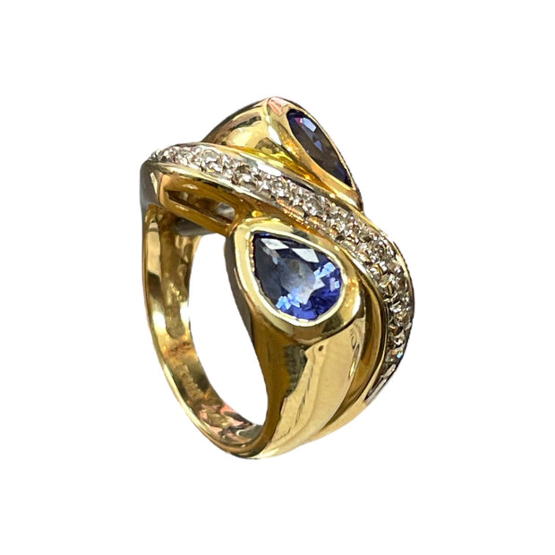 Swirling Beauty: 14K Yellow Gold Pear-Shaped Tanzanite and Diamond Ring