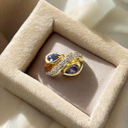 Swirling Beauty: 14K Yellow Gold Pear-Shaped Tanzanite and Diamond Ring