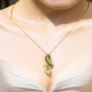 Serpentine Splendor: 14K Yellow Gold Diamond Snake Pendant
