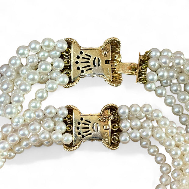 Luxurious Pearl Bracelet with Elegant 14K Gold Diamond Bow Clasp