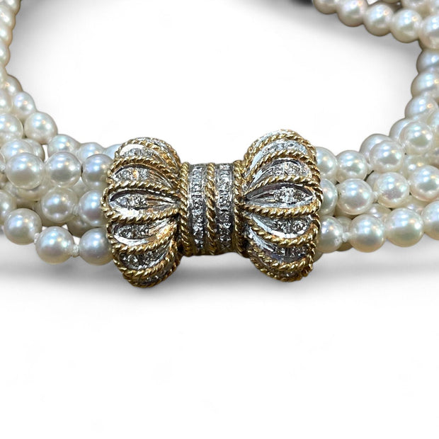 Luxurious Pearl Bracelet with Elegant 14K Gold Diamond Bow Clasp