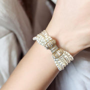 Luxurious Pearl Bracelet with Elegant 14K Gold Diamond Bow Clasp