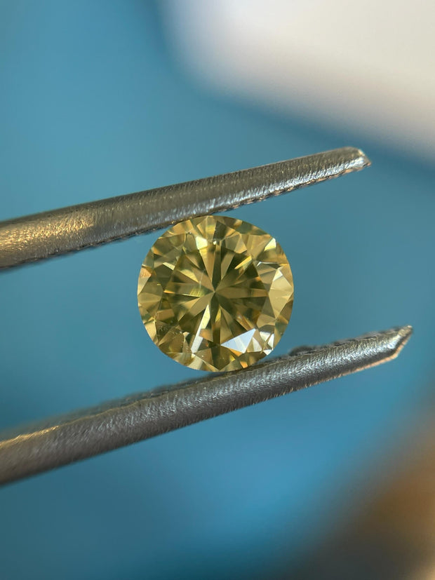 GIA Certified 0.45ct Fancy Yellow Round SI1 Natural Diamond