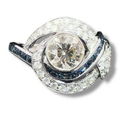 18K White Gold swirling Blue Sapphire and Natural Diamond Ring