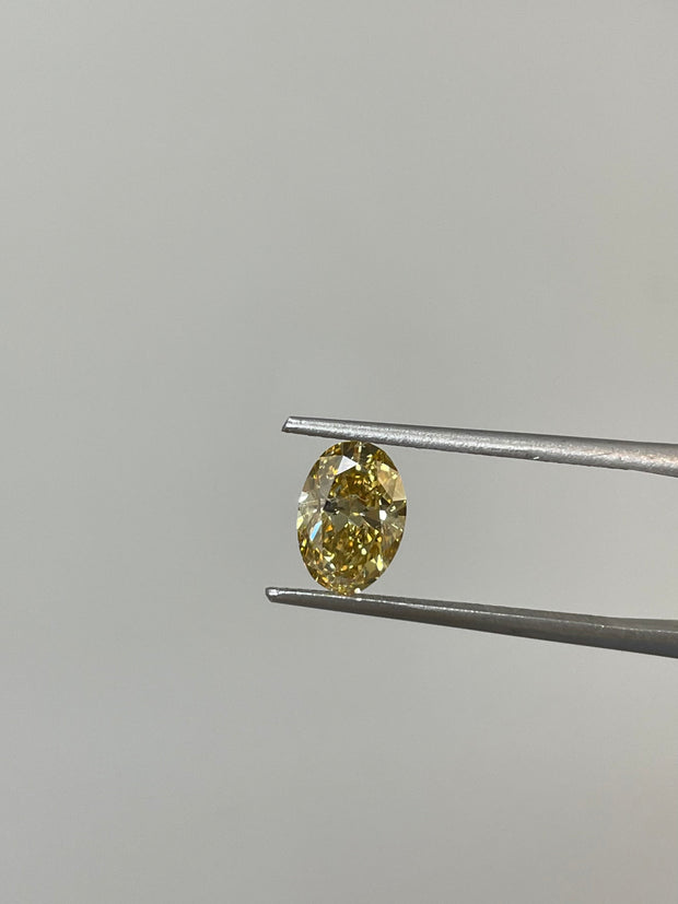 GIA Certified 1.31CT Fancy Brownish Yellow VVS1 Oval Cut Diamond