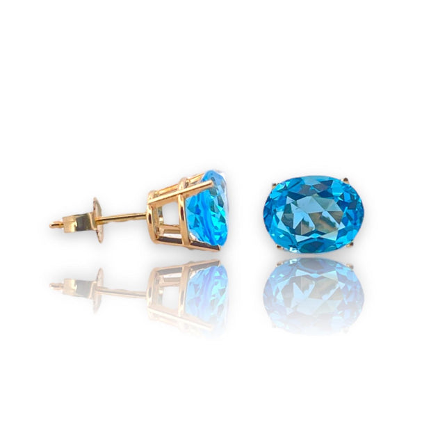 Enchanting Azure Bliss Oval Blue Topaz Studs in 14K Yellow Gold